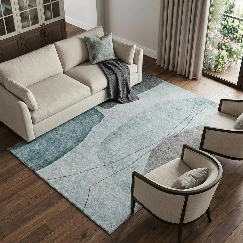 Teal Gray And Ivory Abstract Washable Area Rug With UV Protection Photo 1