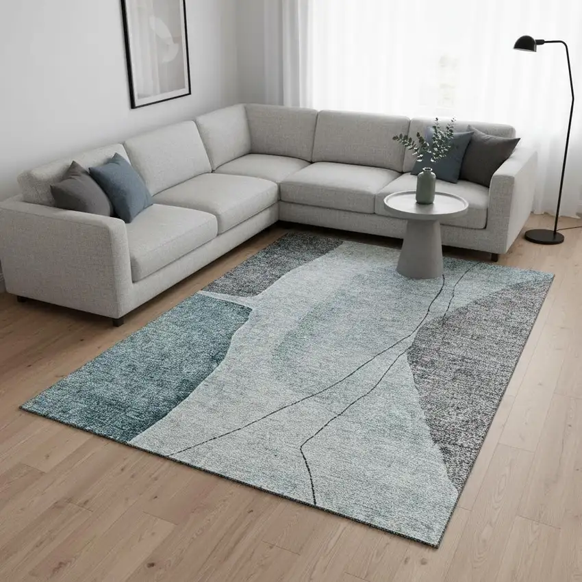 Teal Gray And Ivory Abstract Washable Area Rug With UV Protection Photo 1