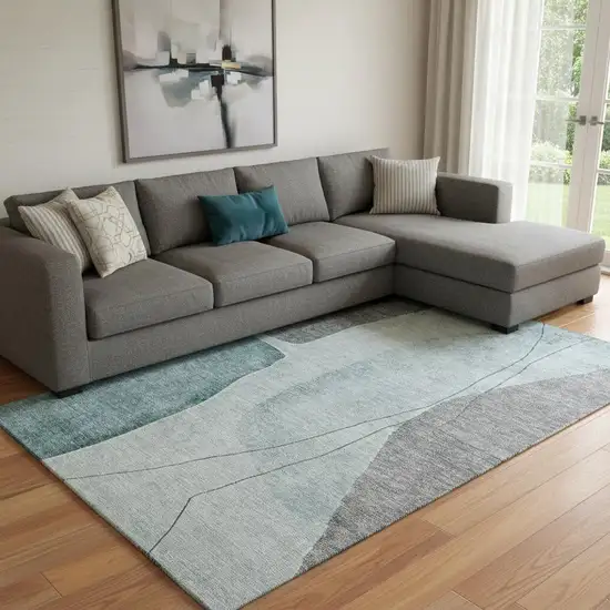 Teal Gray And Ivory Abstract Washable Area Rug With UV Protection Photo 1