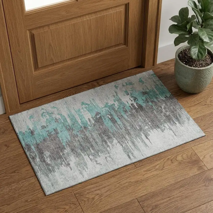 Teal Gray And Ivory Abstract Washable Area Rug With UV Protection Photo 1