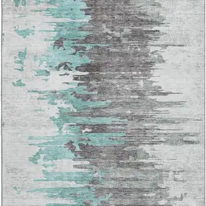 Photo of Teal Gray And Ivory Abstract Washable Area Rug With UV Protection