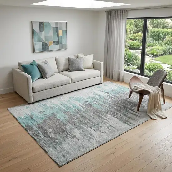 Teal Gray And Ivory Abstract Washable Area Rug With UV Protection Photo 1