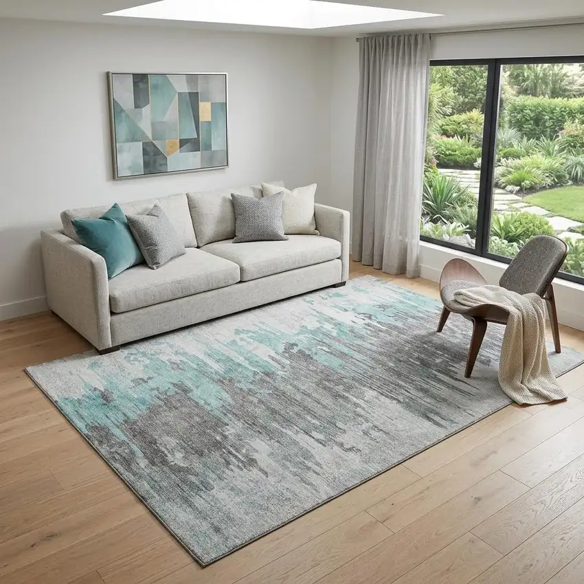 Teal Gray And Ivory Abstract Washable Area Rug With UV Protection Photo 1