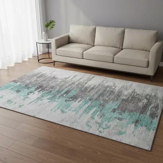 Teal Gray And Ivory Abstract Washable Area Rug With UV Protection Photo 1