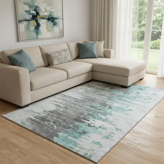Teal Gray And Ivory Abstract Washable Area Rug With UV Protection Photo 1