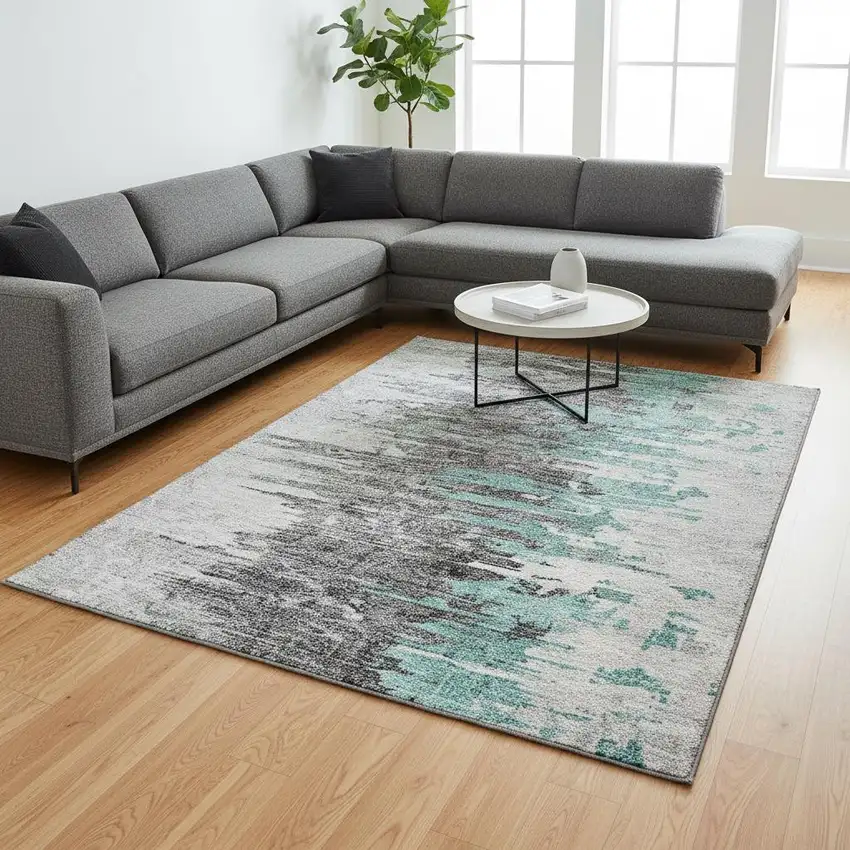 Teal Gray And Ivory Abstract Washable Area Rug With UV Protection Photo 1