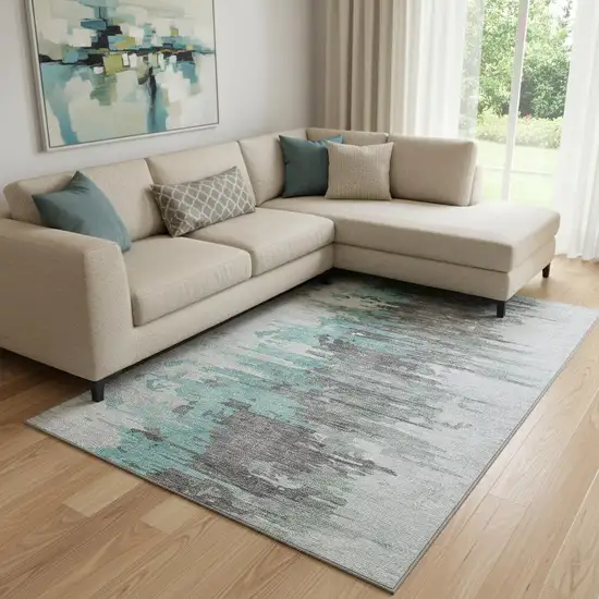 Teal Gray And Ivory Abstract Washable Area Rug With UV Protection Photo 1