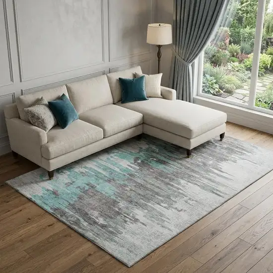 Teal Gray And Ivory Abstract Washable Area Rug With UV Protection Photo 1