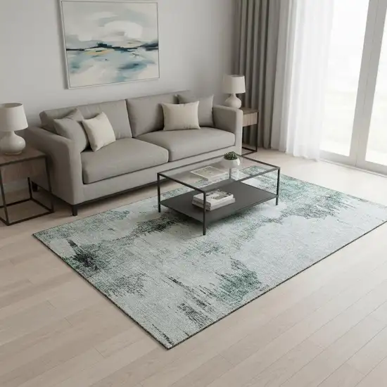 Teal Gray And Ivory Abstract Washable Area Rug With UV Protection Photo 1