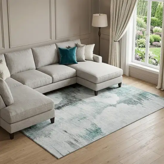 Teal Gray And Ivory Abstract Washable Area Rug With UV Protection Photo 1
