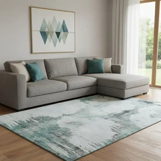 Teal Gray And Ivory Abstract Washable Area Rug With UV Protection Photo 1
