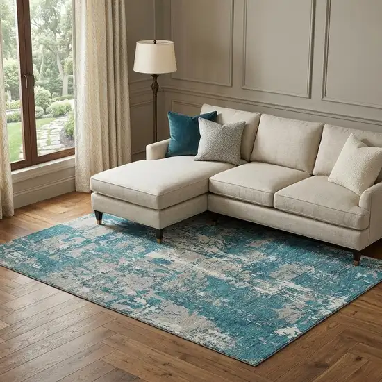 Teal Gray And Ivory Abstract Washable Area Rug With UV Protection Photo 1