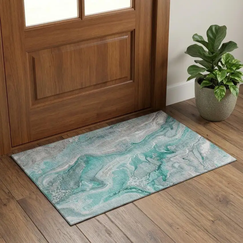 Teal Gray And Ivory Abstract Washable Area Rug With UV Protection Photo 1
