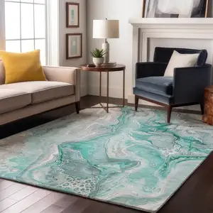Photo of Teal Gray And Ivory Abstract Washable Area Rug With UV Protection