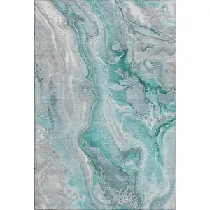 Photo of Teal Gray And Ivory Abstract Washable Area Rug With UV Protection