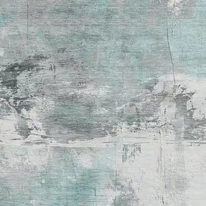 Photo of Teal Gray And Ivory Abstract Washable Area Rug With UV Protection