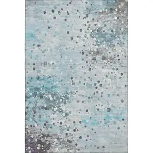 Photo of Teal Gray And Ivory Abstract Washable Area Rug With UV Protection