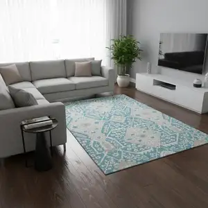 Photo of Teal Gray And Ivory Floral Washable Area Rug With UV Protection