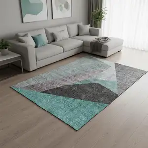 Photo of Teal Gray And Ivory Geometric Washable Area Rug With UV Protection