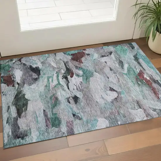 Teal Gray And Rust Abstract Washable Area Rug With UV Protection Photo 1