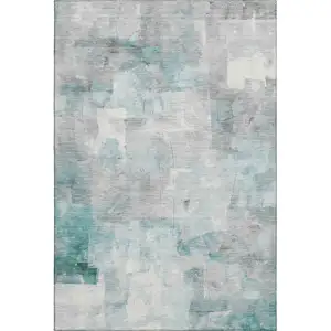 Photo of Teal Gray And Silver Abstract Washable Area Rug With UV Protection