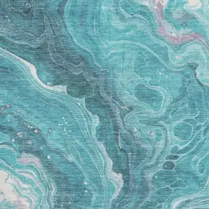 Photo of Teal Gray And Silver Abstract Washable Area Rug With UV Protection