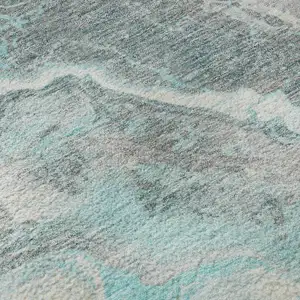 Photo of Teal Gray And Silver Abstract Washable Area Rug With UV Protection