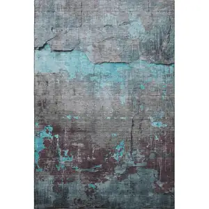 Photo of Teal Gray And Silver Abstract Washable Area Rug With UV Protection