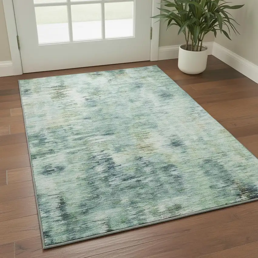 Teal Green And Ivory Abstract Washable Area Rug With UV Protection Photo 2