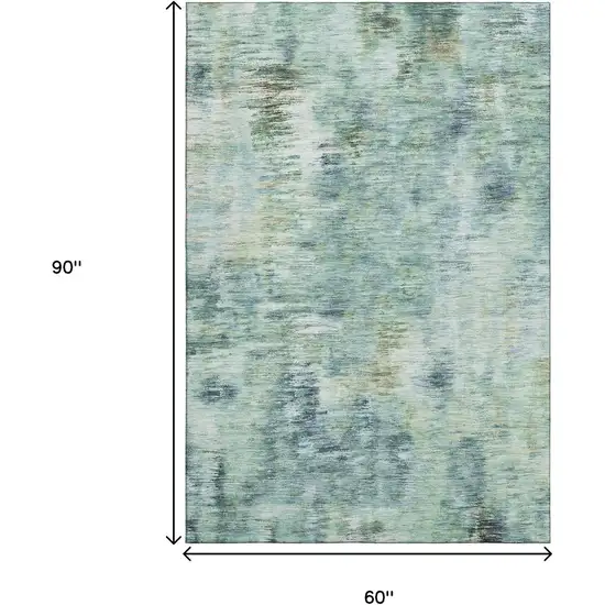 Teal Green And Ivory Abstract Washable Area Rug With UV Protection Photo 3