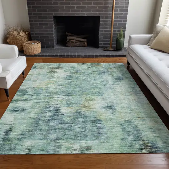 Teal Green And Ivory Abstract Washable Area Rug With UV Protection Photo 6