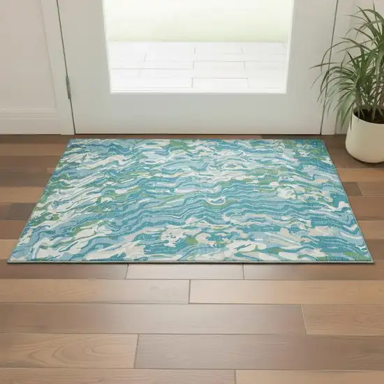 Teal Green And Ivory Abstract Washable Area Rug With UV Protection Photo 2