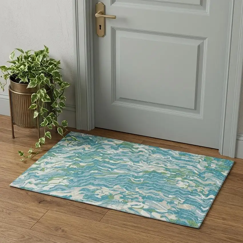 Teal Green And Ivory Abstract Washable Area Rug With UV Protection Photo 1