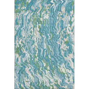 Photo of Teal Green And Ivory Abstract Washable Area Rug With UV Protection