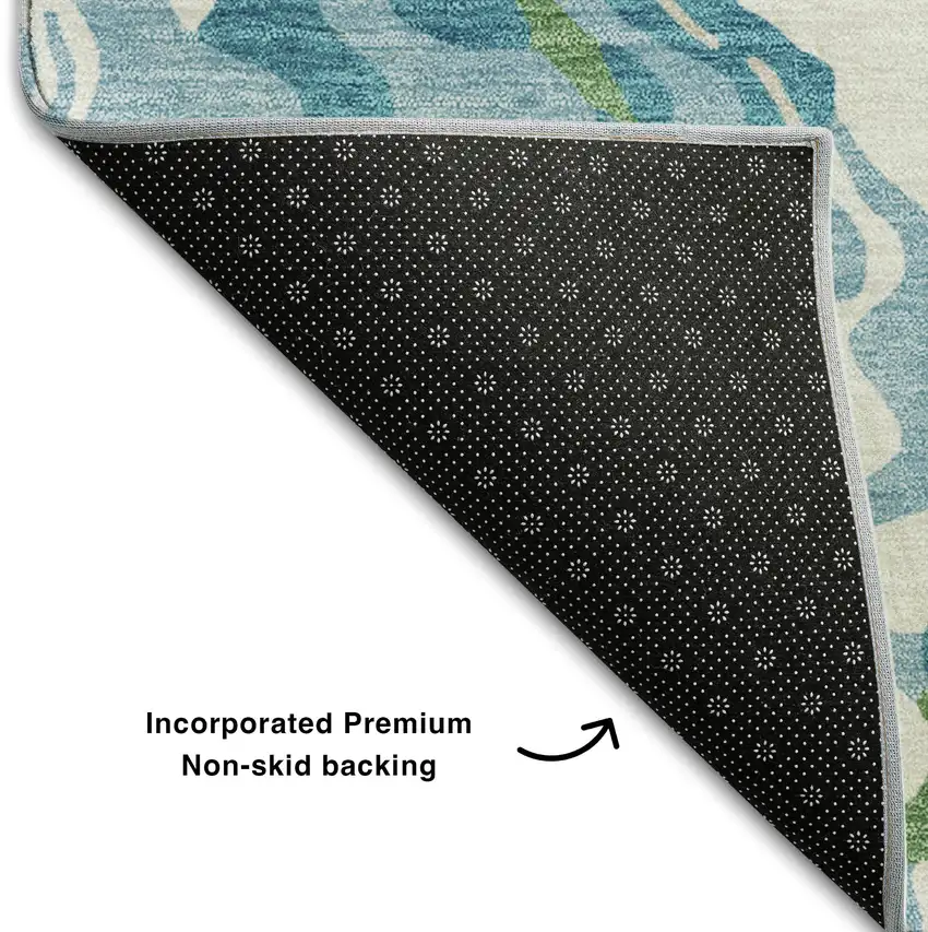 Teal Green And Ivory Abstract Washable Area Rug With UV Protection Photo 6
