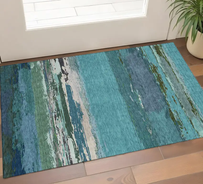 Teal Green And Ivory Abstract Washable Area Rug With UV Protection Photo 1