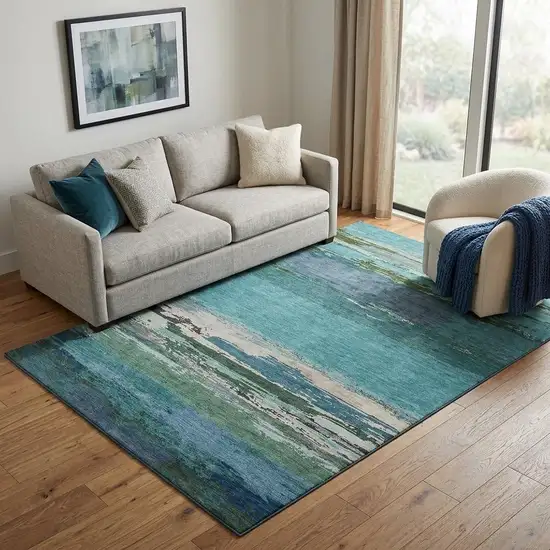 Teal Green And Ivory Abstract Washable Area Rug With UV Protection Photo 1