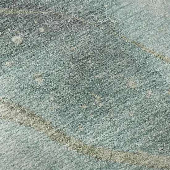 Teal Green And Ivory Abstract Washable Area Rug With UV Protection Photo 1