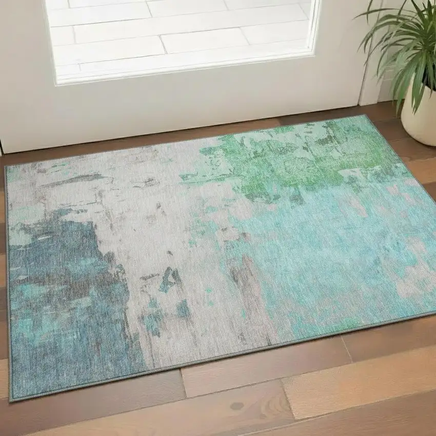 Teal Green And Ivory Abstract Washable Area Rug With UV Protection Photo 2