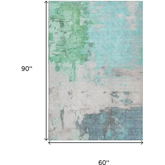 Teal Green And Ivory Abstract Washable Area Rug With UV Protection Photo 9