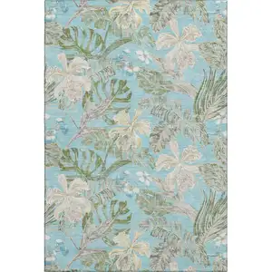 Photo of Teal Green And Ivory Floral Washable Area Rug With UV Protection