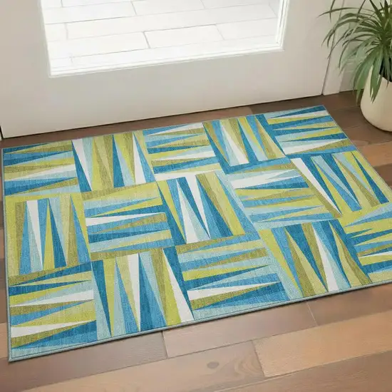 Teal Green And Ivory Geometric Washable Area Rug With UV Protection Photo 2