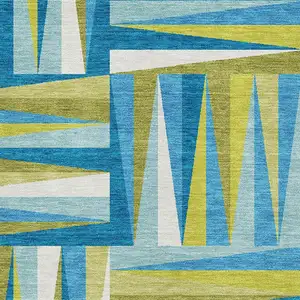 Photo of Teal Green And Ivory Geometric Washable Area Rug With UV Protection