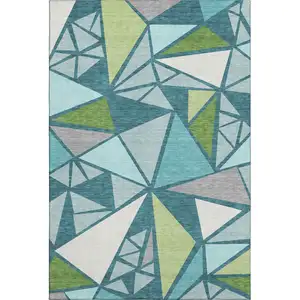 Photo of Teal Green And Ivory Geometric Washable Area Rug With UV Protection
