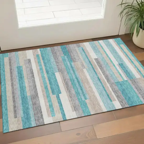 Teal Ivory And Beige Striped Washable Area Rug With UV Protection Photo 1