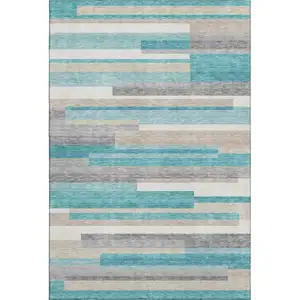 Photo of Teal Ivory And Beige Striped Washable Area Rug With UV Protection