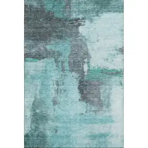 Photo of Teal Ivory And Charcoal Abstract Washable Area Rug With UV Protection