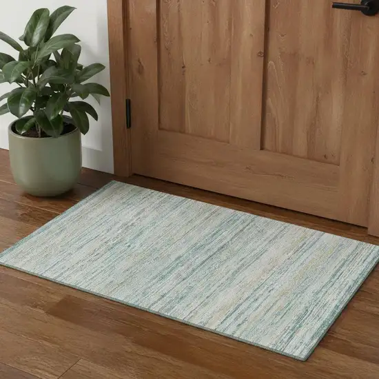 Teal Ivory And Gold Striped Washable Area Rug With UV Protection Photo 1