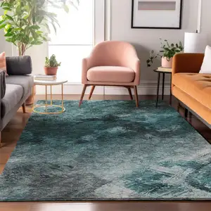Photo of Teal Ivory And Gray Abstract Washable Area Rug With UV Protection