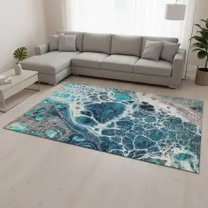 Photo of Teal Ivory And Gray Abstract Washable Area Rug With UV Protection